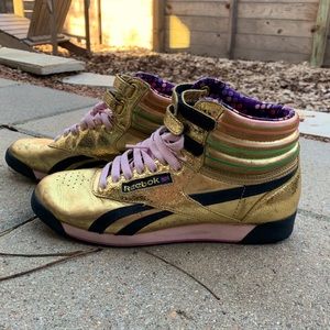 Reebok Freestyle High Top Sneakers in gold